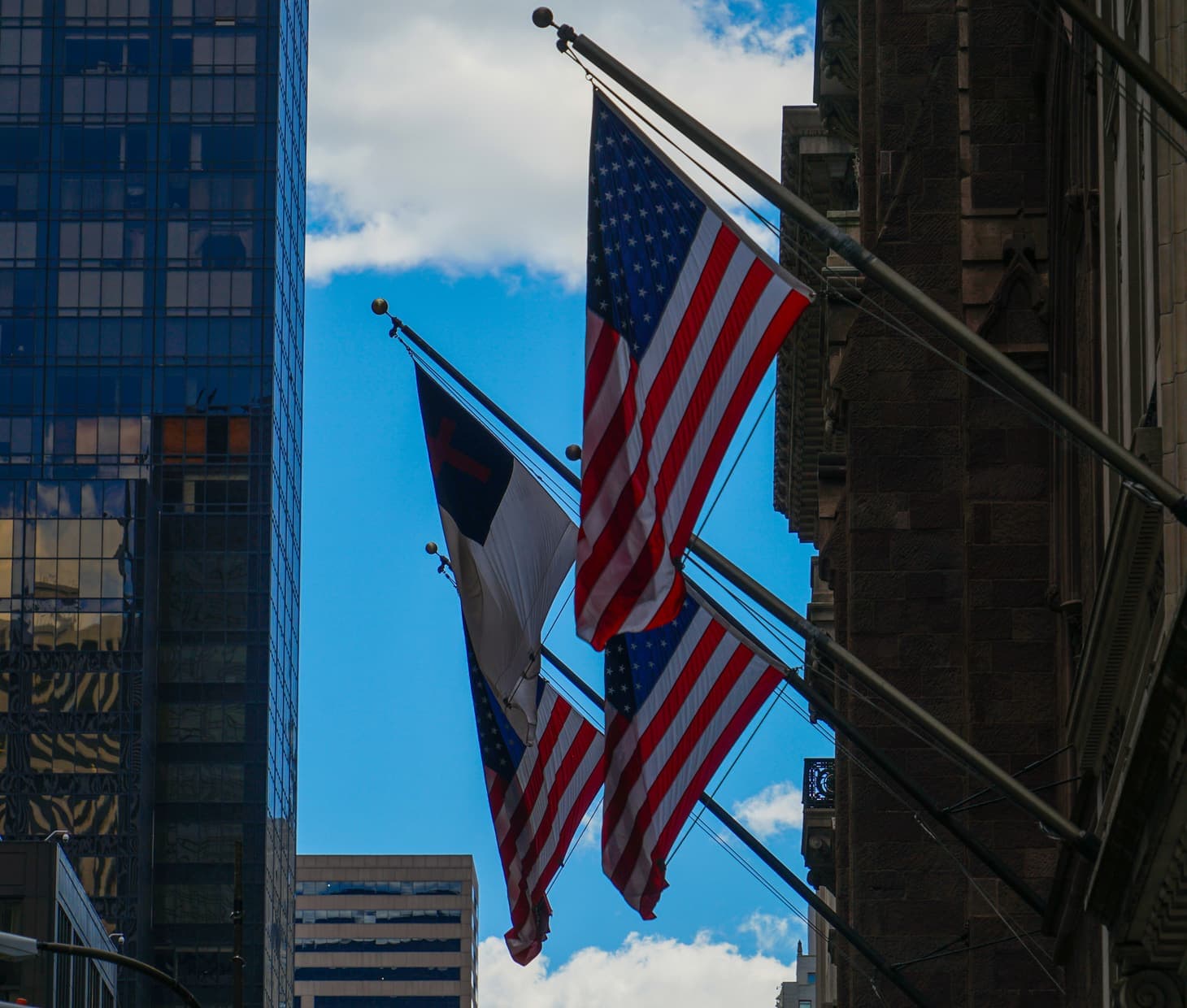 Investor reviewing documents beside a U.S. flag